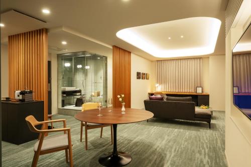 Χώρος καθιστικού στο Hotel Yutoria Fujisato