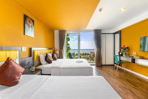 Postel nebo postele na pokoji v ubytování Rich Hotel
