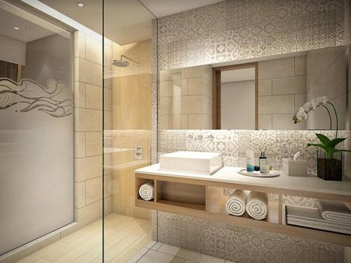 Koupelna v ubytování Hotel Santika Premiere Beach Resort Belitung