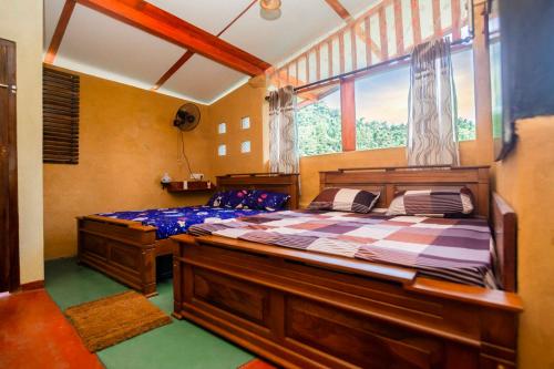 Ένα ή περισσότερα κρεβάτια σε δωμάτιο στο Rainforest View
