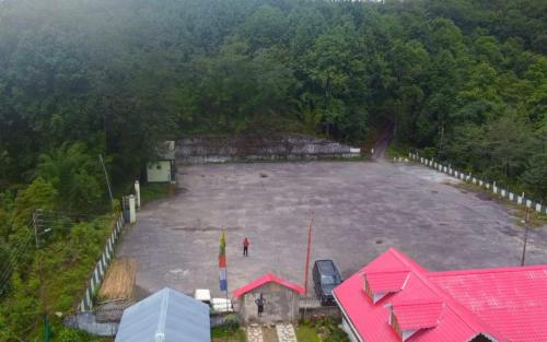 an aerial view of a large field of water at Megitar Homestay by StayApart in Bijanbāri Bāzār