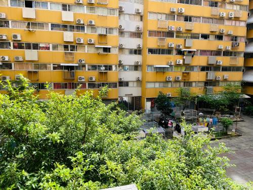 an apartment building with balconies on the side of it at Dailyroom C3,C4by Anna in Nonthaburi