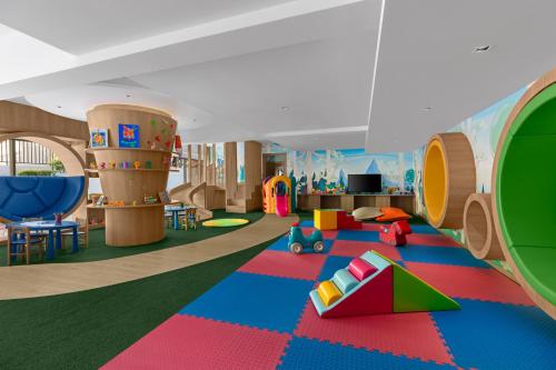 a childrens room with a play area with a playground at Courtyard by Marriott Phuket, Patong Beach Resort in Patong Beach