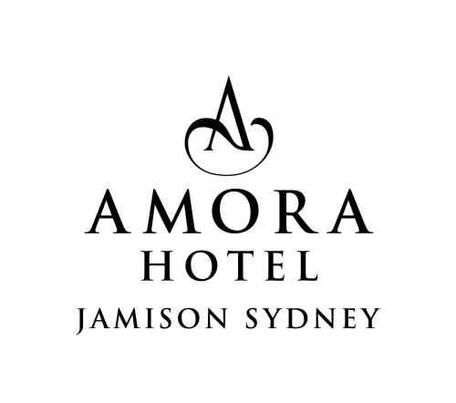 a sign that reads amara hotel amazon synergy at Amora Hotel Jamison Sydney in Sydney