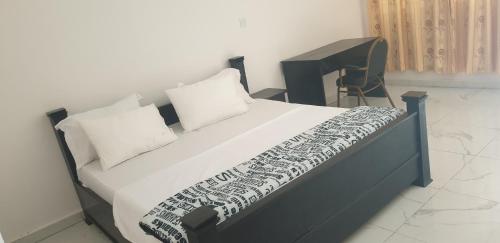 Posteľ alebo postele v izbe v ubytovaní Dakunaia