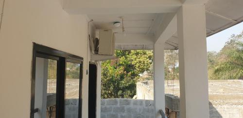 a view from the inside of a house at Dakunaia 