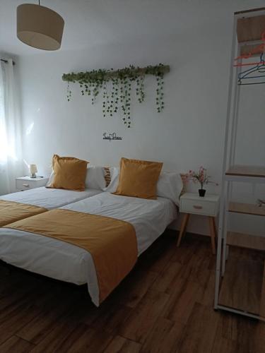 Postel nebo postele na pokoji v ubytování Casa Cobo Exclusivo Alojamiento en Madrid