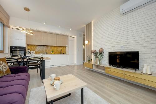 Foto Mokotów Stylish Apartment with Parking & Balcony by Renters Prestige 3