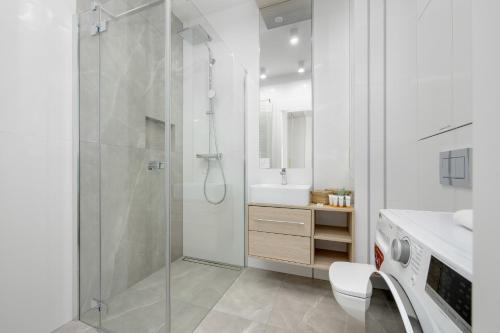 Foto Mokotów Stylish Apartment with Parking & Balcony by Renters Prestige 5
