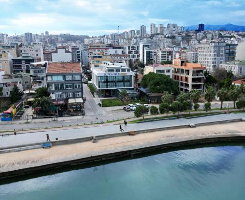 a view of a city with a river and buildings at Elite World Comfy Samsun Atakum in Atakum