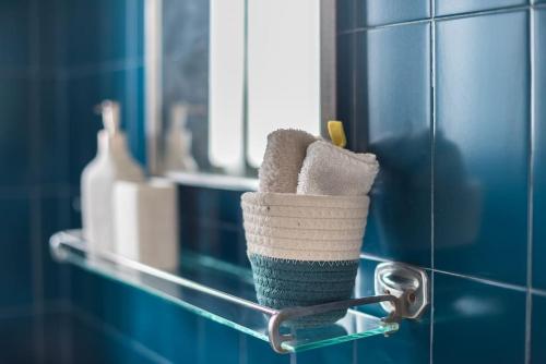 a towel holder on a rack in a bathroom at Open -view Apartment, YGEIA Hospital in Athens