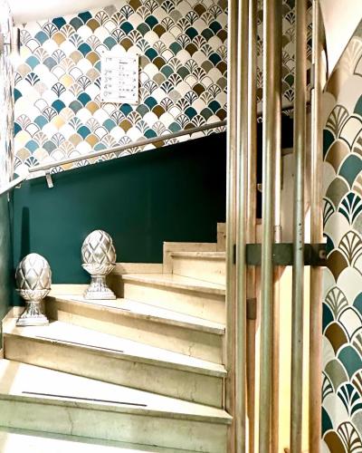 a set of stairs in a room with tiles at Palazzina300 in Treviso