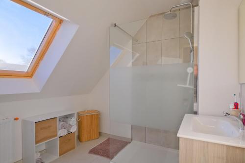 Et badeværelse på La Brise Tropicale - Belle maison avec jardin