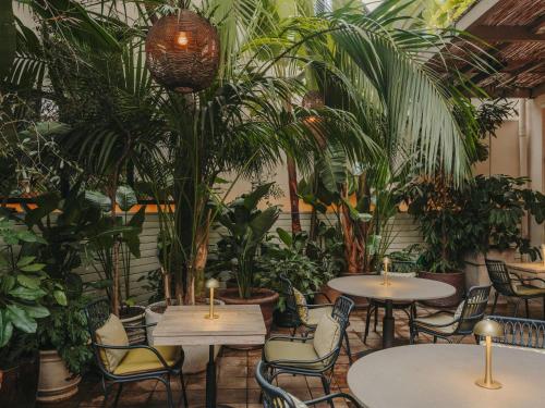 Reštaurácia alebo iné gastronomické zariadenie v ubytovaní Hotel Pulitzer Barcelona
