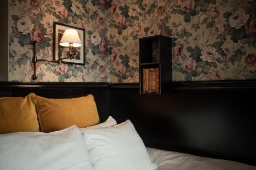 Säng eller sängar i ett rum på Hotel & Ristorante Bellora