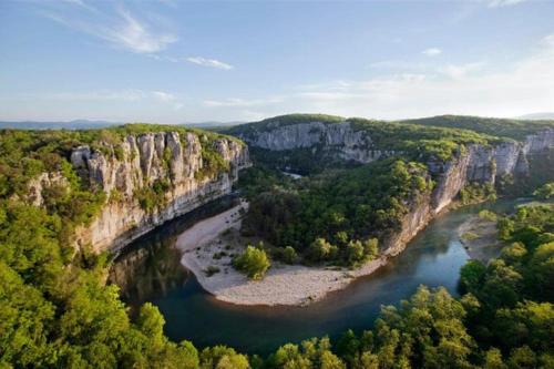 an aerial view of a river in a canyon at Les Sources Gîte Sauvignon in Chambonas
