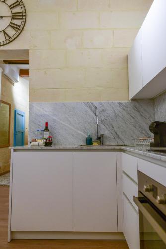 Kuchyň nebo kuchyňský kout v ubytování Valletta Collection - Felix Apartments