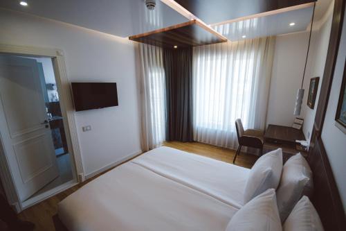 Star Hill Hotel & Spaにあるテレビまたはエンターテインメントセンター