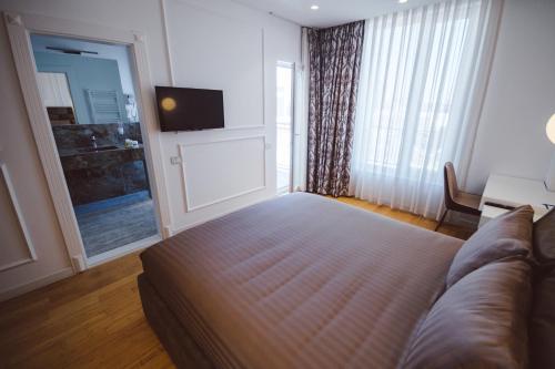 Star Hill Hotel & Spaにあるテレビまたはエンターテインメントセンター