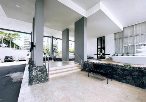 a large bathroom with a tub and a sink at Seaside Serenity in San Juan