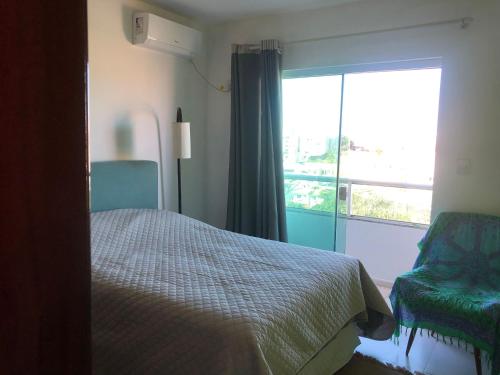Ένα ή περισσότερα κρεβάτια σε δωμάτιο στο Ótimo Apartamento totalmente mobiliado!