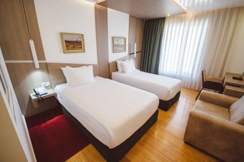 Star Hill Hotel & Spaにあるベッド
