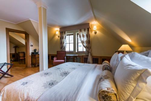 a bedroom with a large bed in a room at Golden Well in Prague