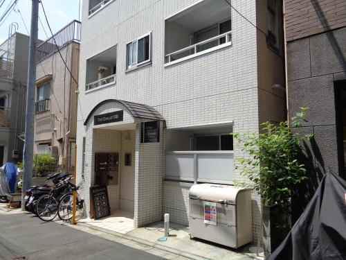 a building with an arched entry way to a building at EMILIO158 - Quiet residential area near Shinjuku Free Wi-Fi in Tokyo