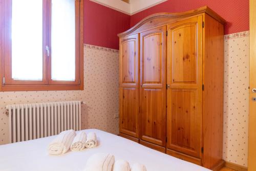 Postel nebo postele na pokoji v ubytování Locanda 77