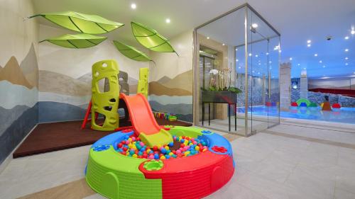 a childrens play room with a toy gym at Hotel Visegrád in Visegrád