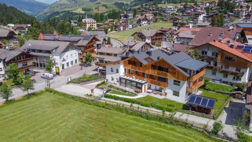 an aerial view of a village with houses at App Piz de Plaies -ciasa Lavarella in San Vigilio Di Marebbe