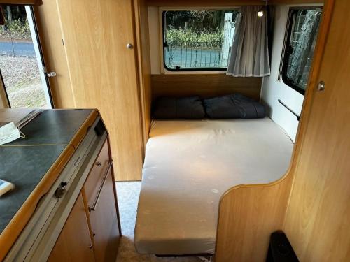 an interior of an rv with a bed in it at Re Come Across Doglamping - Vacation STAY 42085v 