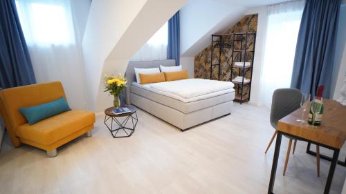 Postel nebo postele na pokoji v ubytování Hotel Böke Lörrach