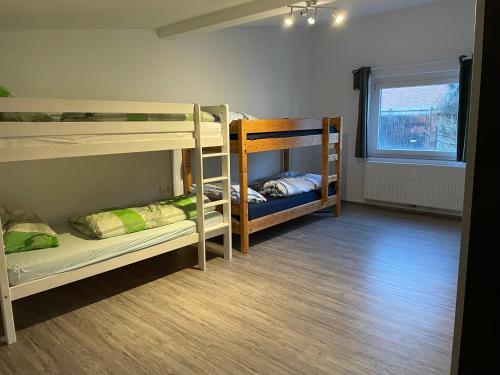 Postel nebo postele na pokoji v ubytování Welcome to Ndé-flat in Abstatt