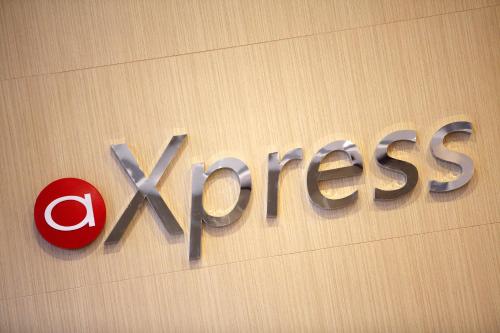 a xoxos sign on the side of a building at Amaris Hotel Citra Raya – Tangerang in Tangerang