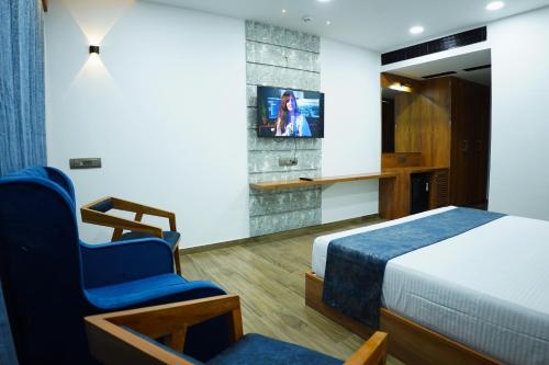 Televisyen dan/atau pusat hiburan di Clarks Safari Kheda, Ahmedabad
