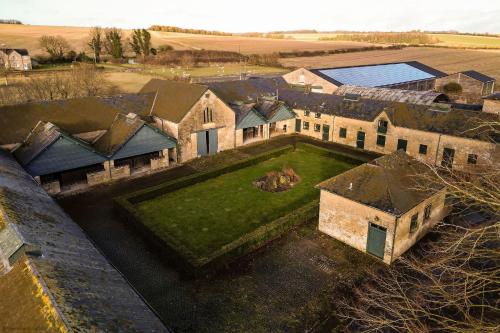 an aerial view of a large house with a yard at The Garret in Salisbury