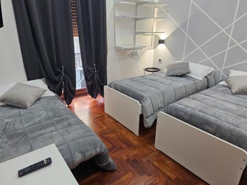 Un pat sau paturi într-o cameră la B&B TERRONIA