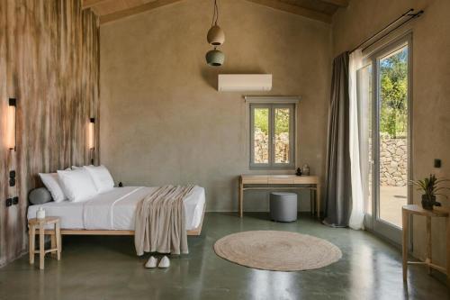 Postel nebo postele na pokoji v ubytování Villa Eugenia Sunrise