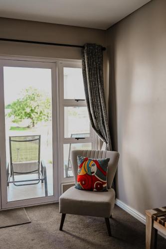 Zona de estar de Gecko Lodge