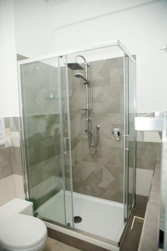 a shower stall with a toilet in a bathroom at La Bella Salernitana in Salerno