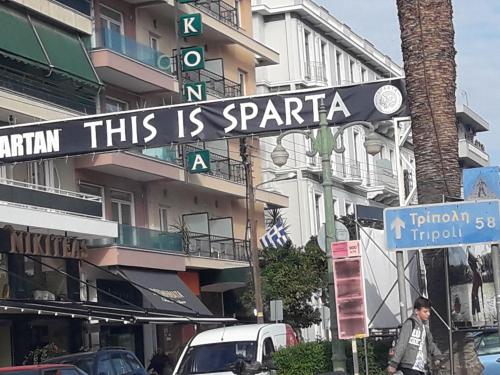a street sign that reads this is sparta at Hellas Palace Rooms CENTER in Sparti