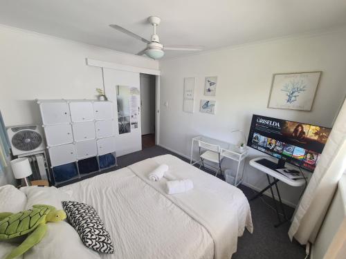 a hospital room with a bed and a tv at Amazing City Location-Private Room in a Share House-2 Rooms available!! in Brisbane