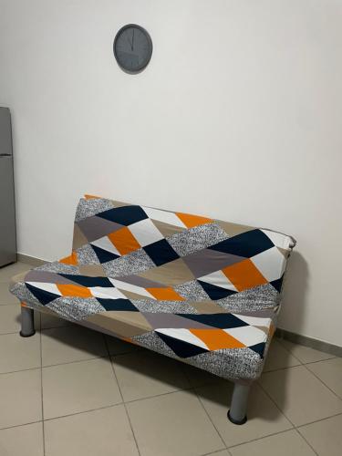 a bench with a quilt on it in a room at Terra Sole Monica Camera Sole in Pontecorvo