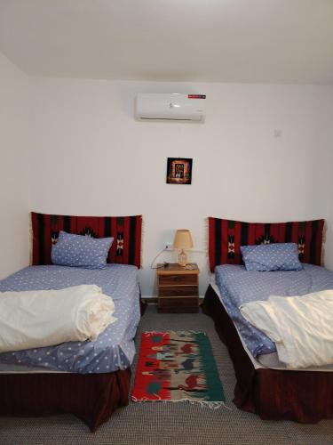 Ένα ή περισσότερα κρεβάτια σε δωμάτιο στο Petra Magic Guest House