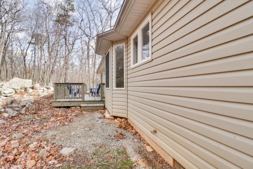a side view of a house with a porch at McGaheysville Vacation Rental, 1 Mi to Skiing! in McGaheysville