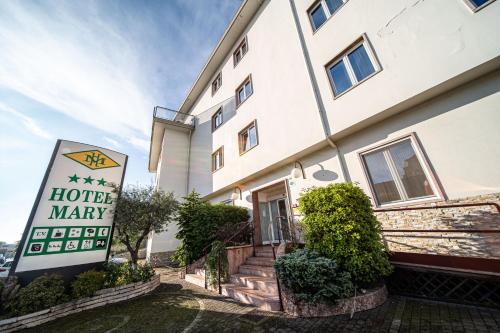 a hotel marry sign in front of a building at Hotel Mary in Vicenza