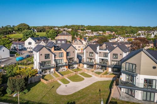 an aerial view of a residential neighborhood with houses at Superb 3 Bed House Close To Snowdonia in Llansantffraid Glan Conwy