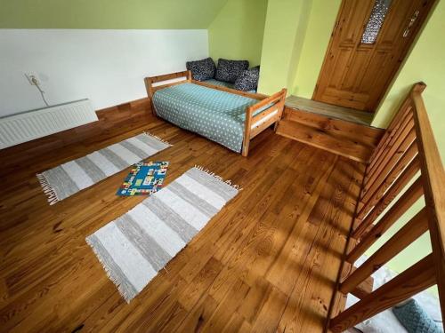 Postel nebo postele na pokoji v ubytování Green Garden Apartman
