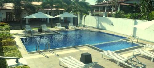 A view of the pool at New Sithi Villas or nearby